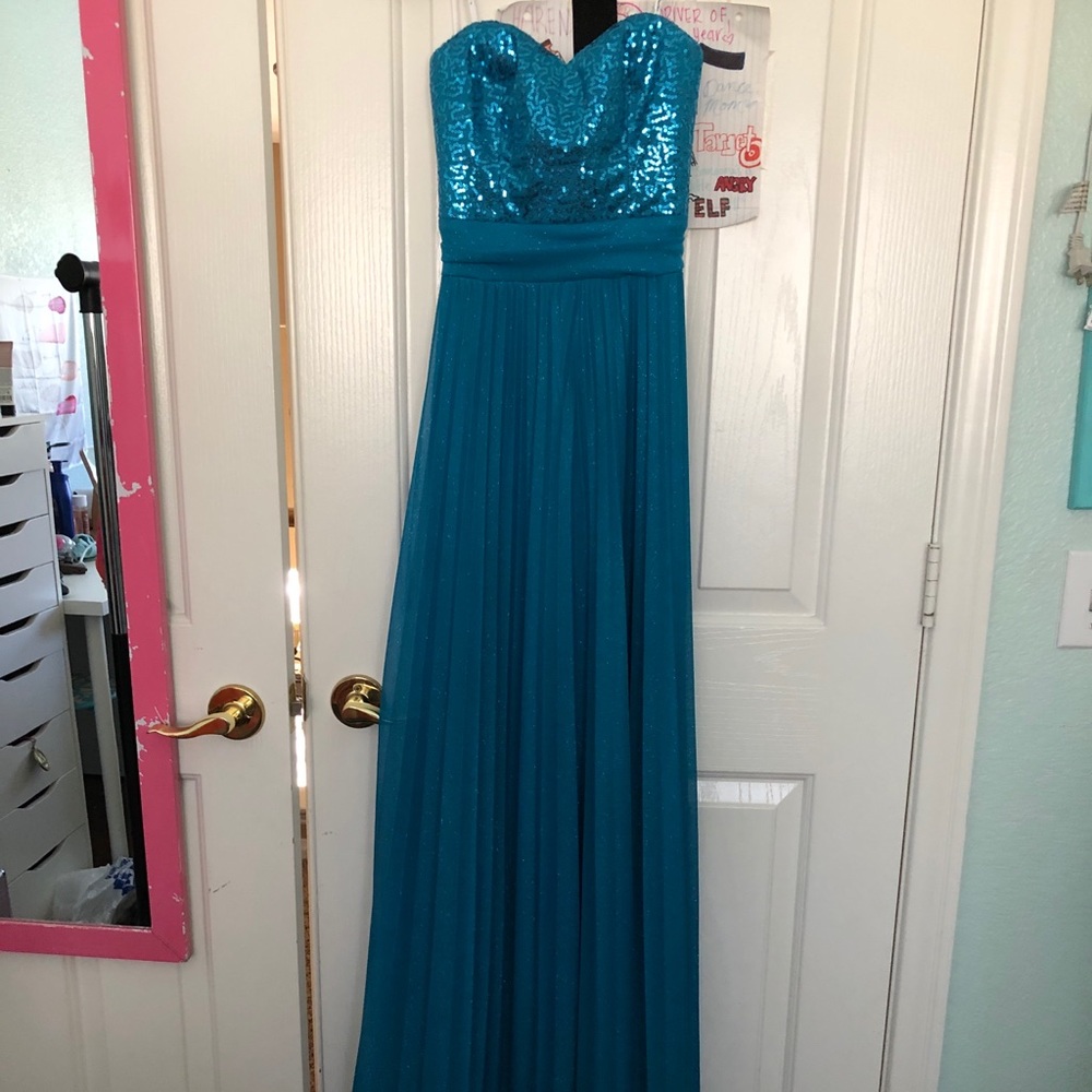 Sparkly blue strapless formal gown